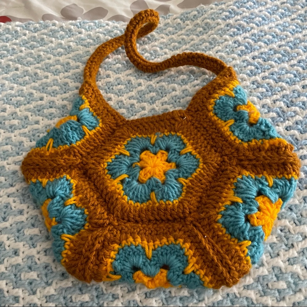Crocheted granny square hand bag